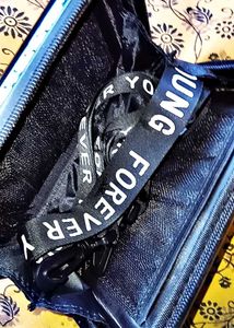 Black Clutch with "Forever Young" Strap