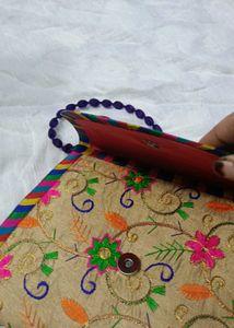 Embroidered Clutch Bag with Beaded Strap