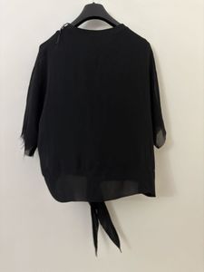 Chic Black Sheer Tie-Back Top