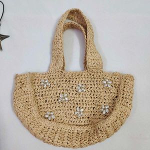 Straw tote bag with pearl embellishments