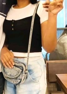 White croptop with black tank top