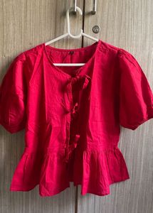 Chic Red Peplum Blouse with Tie Detail