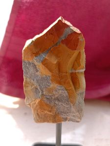 ROUGH CRYSTAL ROCK IN A STAND