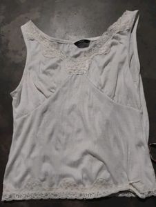 white hand stitched sleeves top