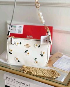 Coach nolita with box packing rakhi sale