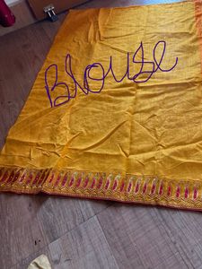 Elegant Orange Embroidered Saree
