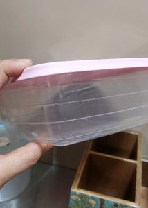 four Plastic Food Containers