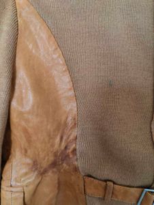 Knit Jacket with a burn mark
