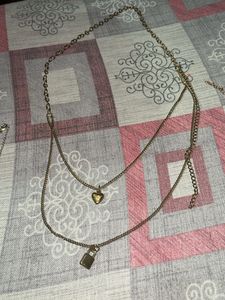 Layered Necklace with Heart and Lock Pendant