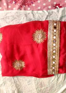 Red saree with mirror work border