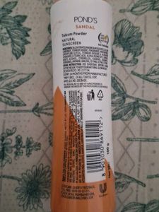Pond's Sandal Radiance Talcum Powder