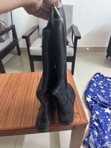 Black Knee-High Boots with Gold Accent