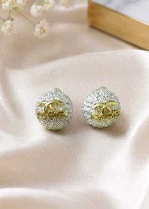 Chanel Paris Stud Earrings