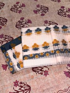 Elegant White Saree with Blue &amp; Yellow Motifs