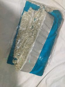 Beautiful Teal Saree with Silver Border