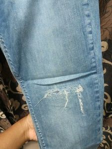 Light Blue Distressed Denim Jeans