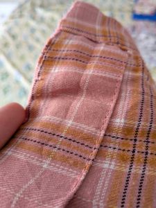 pink pleated checked skirt
