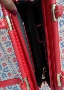 Red Metallic Finish Hand Bag