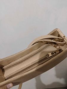 Stylish Beige Hobo Bag with Gold Chain