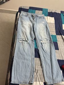 Ripped Knee Jeans