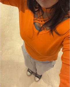 Orange Cut-Out Turtleneck Top