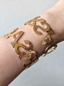Statement Golden-Tone Bangle Bracelet
