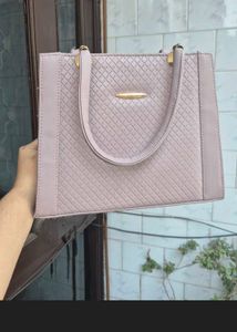 lavender handbag with sling strap