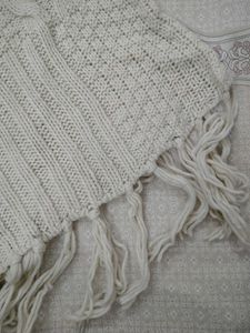 Elegant Knitted Poncho with Fringe