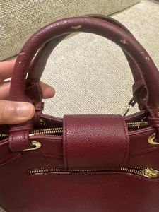 BVLGARI Chic Maroon Handbag with Snake Charm