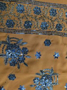 Embroidered Kurti with Brown Pants
