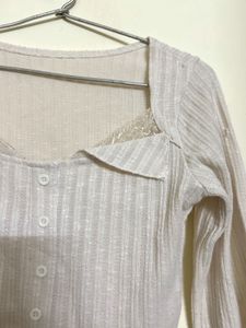 Cream Ribbed Bell Sleeve Top