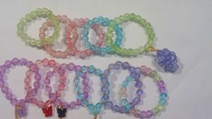 Set of Beaded Bracelets with Charms