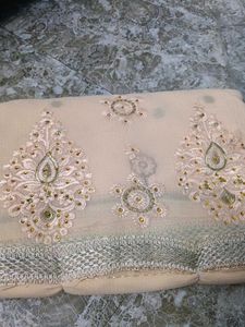 Elegant Cream Embroidered Saree