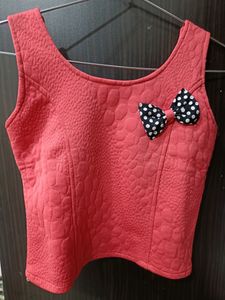 Top With Cute Tie Design At The Back And Front And With The Pink Colour At Size S