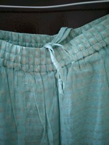 Elegant premium Teal Kurta set with Embellished Ne