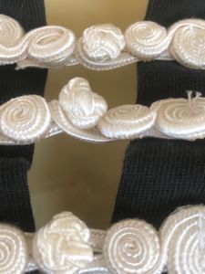 Elegant Black Blouse with White Trim