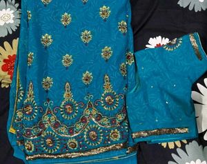 Stunning Teal Embellished Saree