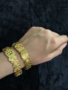 Exquisite Gold Bangles with Enamel