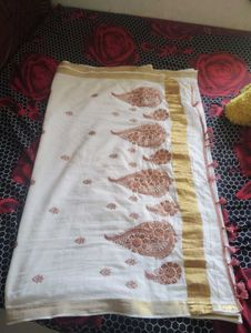 Elegant White Kerala Saree with Paisley Embroidery