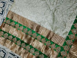 Grand Cream Saree with Green-Golden border