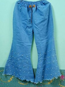 flared jeans with pearl