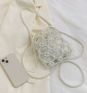 Elegant Pearl Embellished Clutch