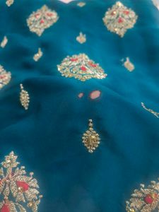 Elegant Teal Embroidered Saree