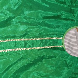 Green silk color kutra with lace in front. perfect for mending functions.  custom made..size 42.never worn