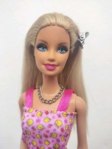 Barbie doll with pink dress