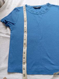 Blue Ribbed Lettuce Hem Top