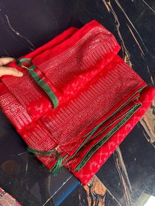 Vibrant Red Saree with Intricate Silver Weave