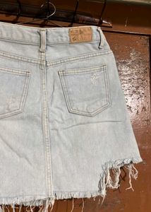Light Wash Ripped Denim Skirt