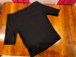 Black Ribbed top with puffer jacket