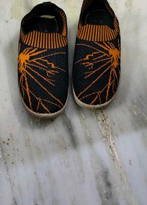 Stylish Black &amp; Orange Slip-On Shoes